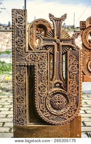 Oshakan,armenia,19 Februar,2018: Stone Cross Carved With Ornaments In The Form Of The Thirteenth Let