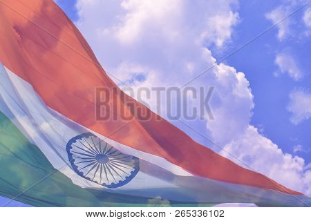 Tiranga Image On Blue Sky With Clouds