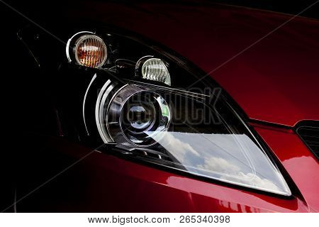 Car Headlights Of Red Color Dark Tone Is Aggressive And Gorgeous.