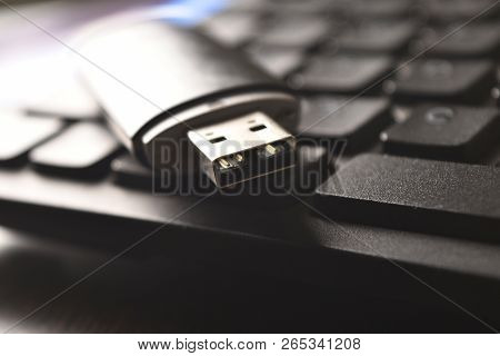 Dongle On Keyboard , Internet Equipment Concept , Text Space