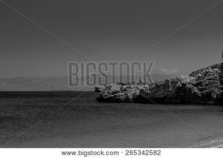 Houcima Beach And Waves And Rocks