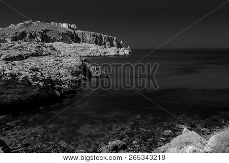 Houcima Beach And Waves And Rocks