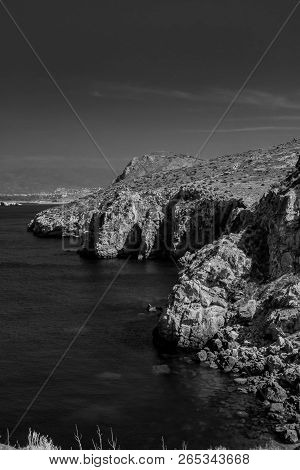 Houcima Beach And Waves And Rocks
