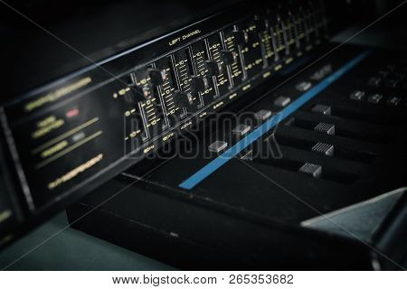 Close-up Filtered Shot Of A Sound Equa;izer Or Controller