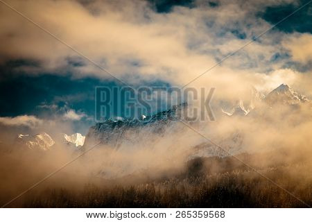 Mangart Capped By The Fog In A Winter Day
