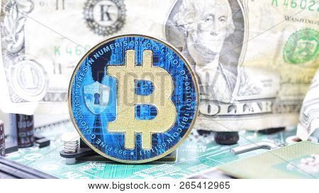 Crumpled Dollar Money And  Bitcoin In The Motherboard
