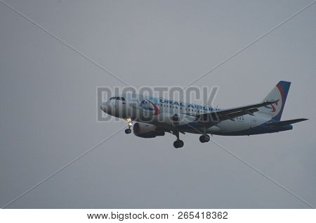 8 July 2018 Russia, Moscow. The Aircraft Airbus A319 Ural Airlines Is Landing At The Domodedovo Airp