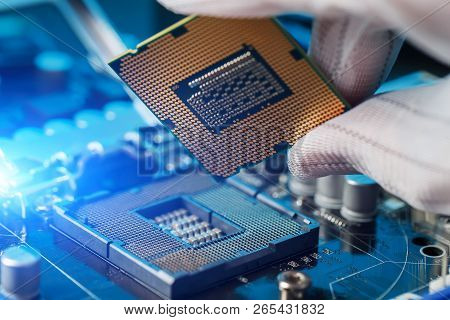 Electronic Engineer Of Computer Technology. Maintenance Computer Cpu Hardware Upgrade Of Motherboard
