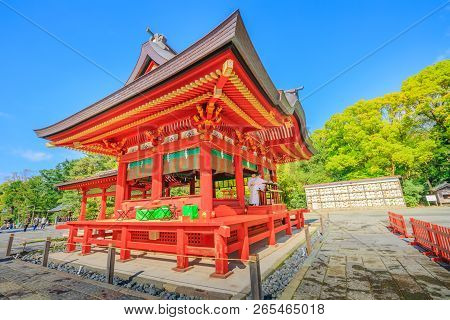 Kamakura, Japan - April 23, 2017: Two Monks Inside Lower Worship Hall At Tsurugaoka Hachiman, The Mo