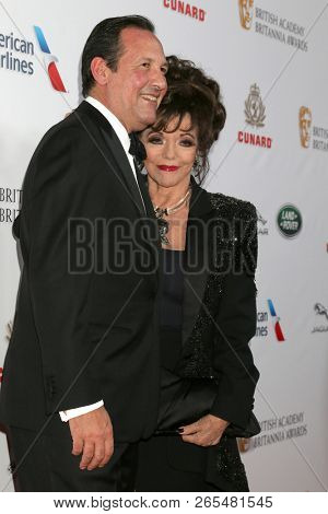 LOS ANGELES - OCT 26:  Percy Gibson, Joan Collins at the 2018 British Academy Britannia Awards at the Beverly Hilton Hotel on October 26, 2018 in Beverly Hills, CA