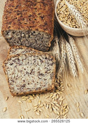 Multi-grain Bread On A Wooden Background. Healthy Food Concept.