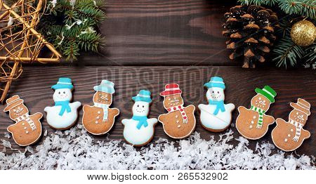Many Differrent Christmas Homemade Gingerbread Cookies Funny Snowman. On Wooden Table.closeup.top Vi