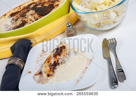 The Endive Gratin With Ham And Bechamel Sauce