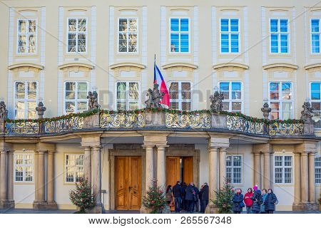 Prague, Czech Republic - December 1, 2012: Castle District,  Tourists On Front Of  The Kralovsky Pal