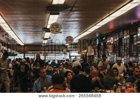 New York, Usa - May 29, 2018: Customers Sitting At The Tables, Eating Inside Katzs Deli In New York,