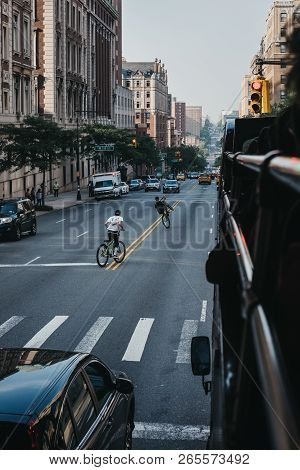 New York, Usa - June 1, 2018: Teenagers Riding Bikes On The Road In Harlem, New York. Since The 1920