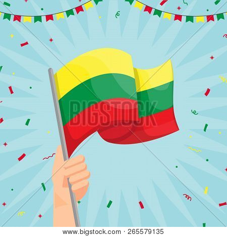 Hand Holding Lithuania Flag. Lithuania Flag In Cartoon Style. Winner Concept. Confetti Concept. Vect