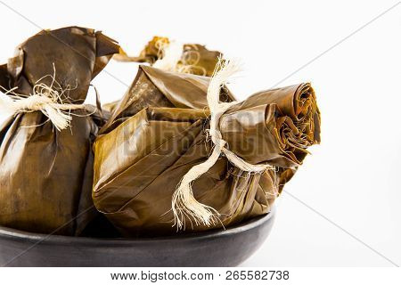 Traditional Colombian Tamale As Made On Tolima Region Isolated On White Background