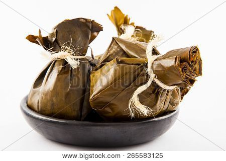 Traditional Colombian Tamale As Made On Tolima Region Isolated On White Background