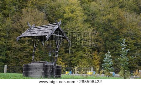 Wooden Well In The Village. Wooden Well In Garden