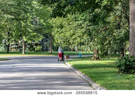 Angringnon Park, Lasalle, Quebec - August 31, 2018 - Sunny Day In Angringnon Park, Lasalle With A Wo