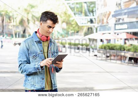 Man Using A Tablet.