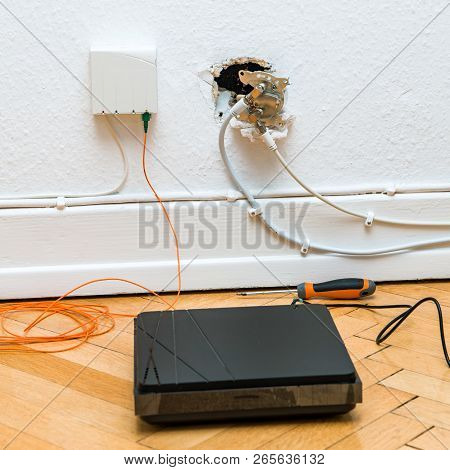 Fiber Optic Installation At Home With Obsolete Catv And New Ftth Fiber Outlets And Internet Receiver