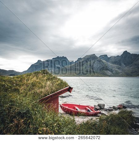 A Typical House Of The Fishermen Called Rorbu On The Beach Frames The Sea At Ramberg Lofoten Islands