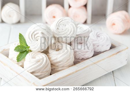 Marshmallow Or Zefir Dessert In Box  On White Plate With Mint