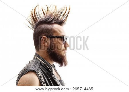 Profile face shot of a male punker with mohawk hairstyle isolated on white background
