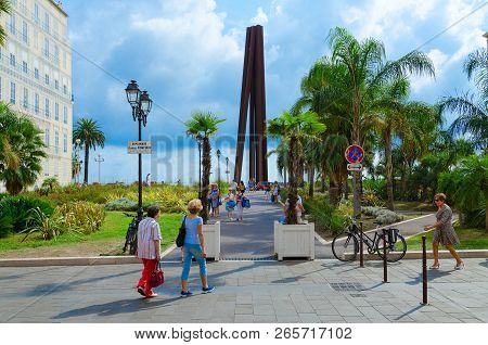 Nice, France - September 15, 2018: Unknown People Walk To Obelisk De Venet, Or Nine Oblique Lines (n
