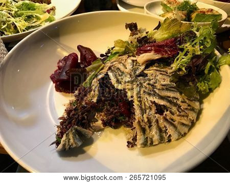 Anchovy With Black Rice / Hamsi Pilav Or Pilaf Served With Salad.