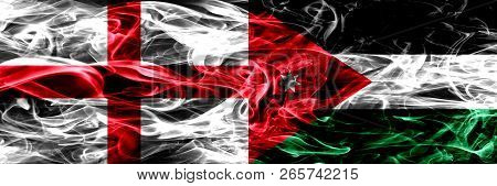 England Vs Jordan, Jordanian Smoke Flags Placed Side By Side. Thick Colored Silky Smoke Flags Of Eng