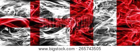 England Vs Peru, Peruan Smoke Flags Placed Side By Side. Thick Colored Silky Smoke Flags Of English 