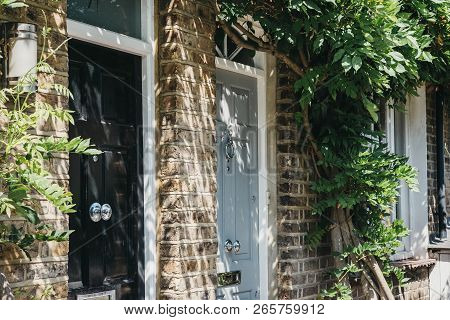 London, Uk - August 1, 2018: Close Up Of Wooden Doors Of A Traditional Victorian House In Barnes, An