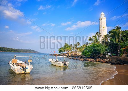Southernmost Point In Sri Lanka, The White Lighthouse On The Shores Of The Indian Ocean