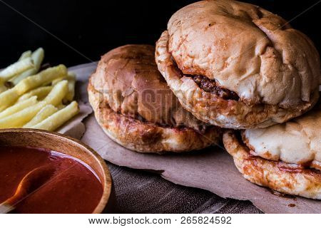 Turkish Wet Burger With Sauce And Potatoes. / Islak Hamburger