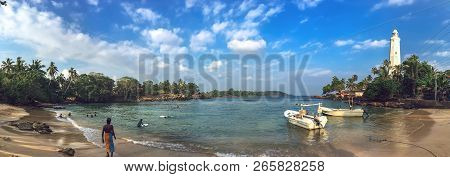 Southernmost Point In Sri Lanka, The White Lighthouse On The Shores Of The Indian Ocean