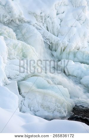 frozen waterfall Tannforsen in winter, Sweden