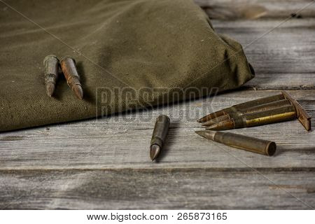 7, 92 X 57 - Rustic Ammos And Poncho Lies On The Wooden Background