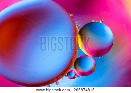 Abstract Background With Colorful Gradient Colors. Oil Drops In Water Abstract Psychedelic Pattern I