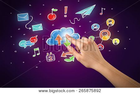 Female hand toucing mixed media icons with purple background