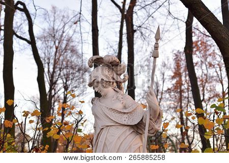 Goddess Minerva Statue In Summer Garden At Autumn Evening, St.petersburg, Russia. Minerva Is The God