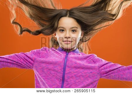 Kid Girl Long Healthy Shiny Hair. Little Girl Grow Long Hair. Teaching Child Healthy Hair Care Habit