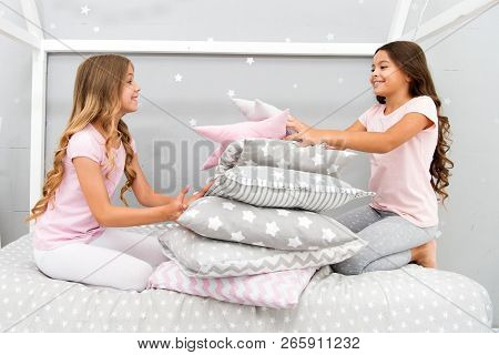 Girls Happy Best Friends In Pajamas With Pillows Sleepover Party. Soulmates Girls Having Fun Sleepov