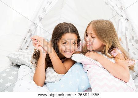 Sisters Share Gossips Having Fun At Home. Pajamas Party For Kids. Cozy Place Tipi House. Sisters Or 