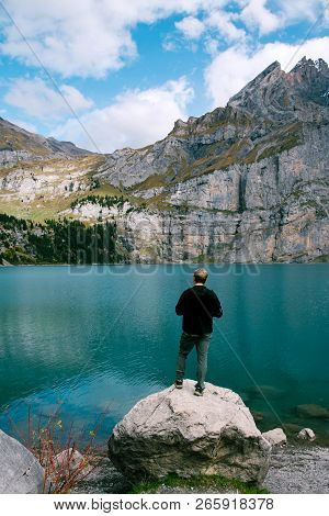 Hiker Enjoing Beautiful View Of Lago Di Braies Or Pragser Wildsee, Trentino Alto Adidge, Dolomites M