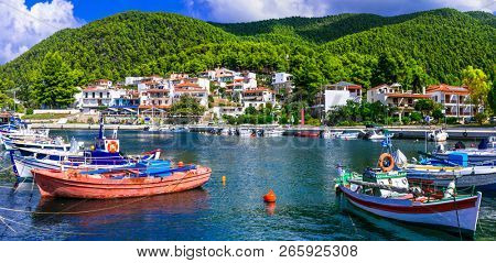 Beautiful green Skopelos island- traditional fishing village Neo Klima in Greece