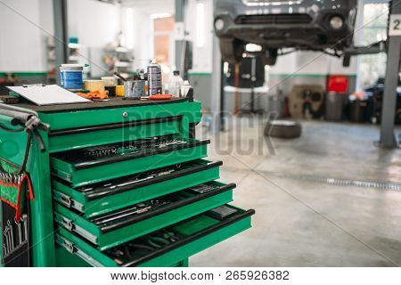 Car service tool box with pull-out shelves