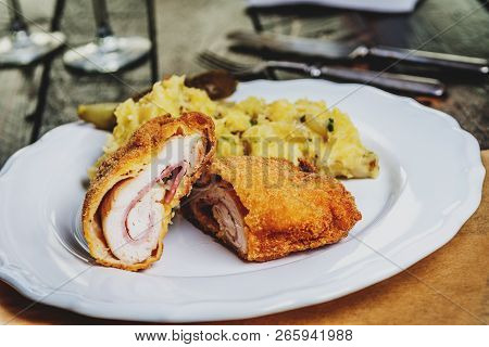 Traditional French Cuisine Chicken Roll Cordon Bleu Or Gordon Blue With Cheese, Ham And Mashed Potat